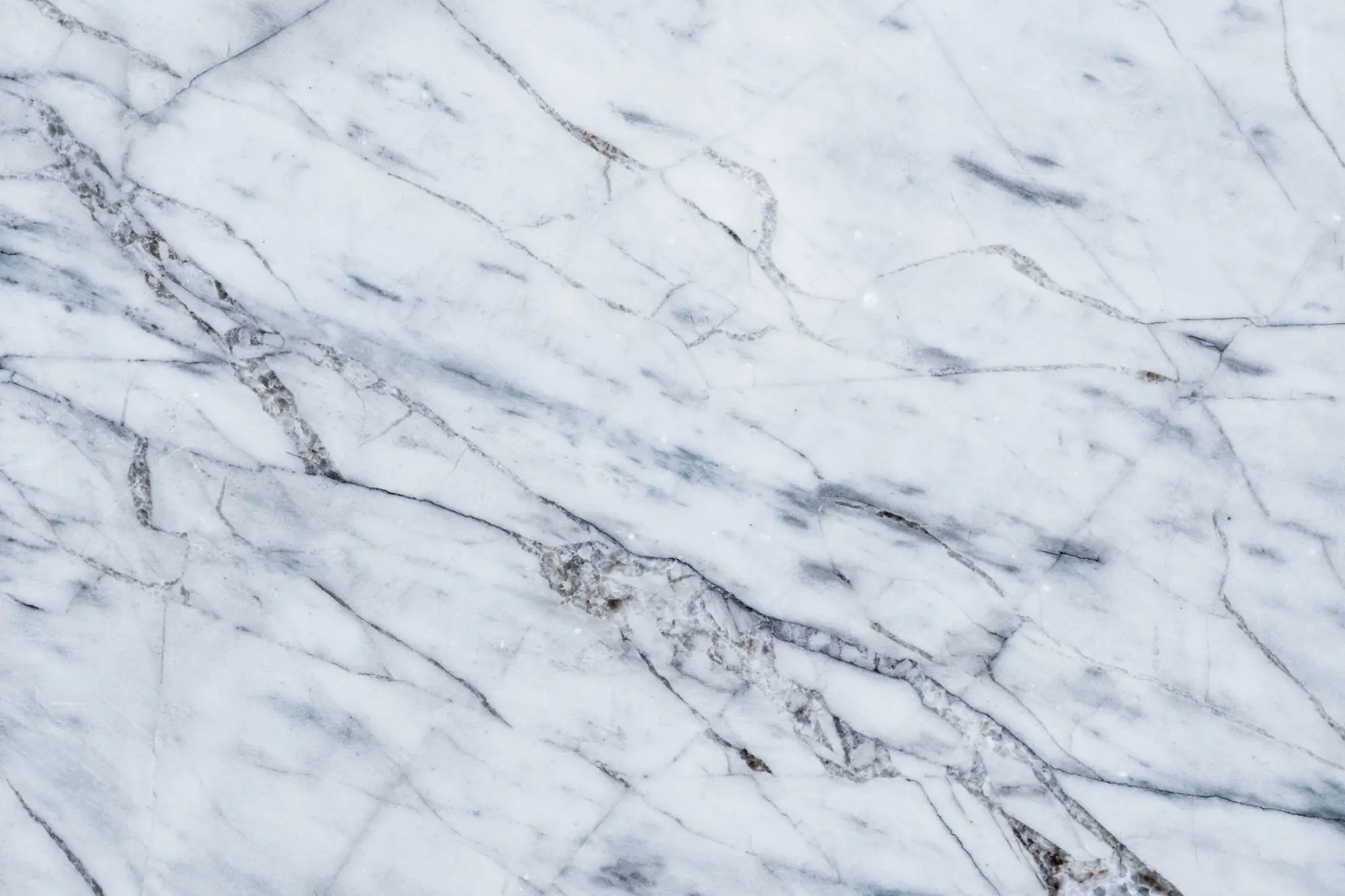 Close view of white marble with fine grey veining